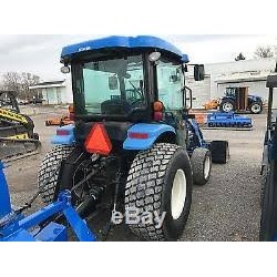 NEW HOLLAND Boomer 2030 - Luna trasera